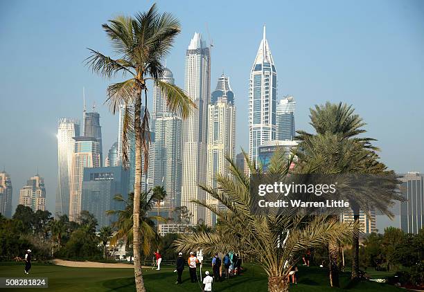 Kristoffer Broberg of Sweden putts on the 12th green during the first round of the Omega Dubai Desert Classic on the Majlis course at the Emirates...