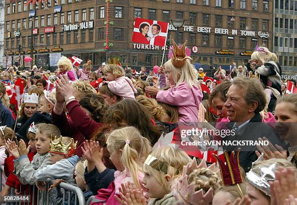 Large crowd wait to get a glimpse of H.R.H. Crown Prince Frederik and Mary Elizabeth Donaldson of Australia, outside Copenhagen's City Hall 12 May...