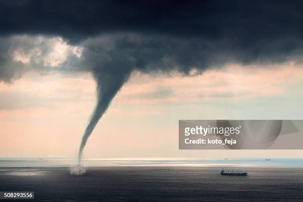 tornado sea - extreme weather stock pictures, royalty-free photos & images