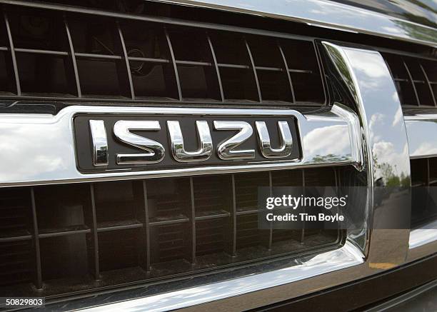 The grille of a new Isuzu Ascender is seen at Schaumburg Isuzu May 12, 2004 in Schaumburg, Illinois. Isuzu plans on discontinuing its Rodeo sport...