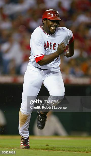 Right fielder Vladimir Guerrero of the Anaheim Angels runs to first base during the game against the Detroit Tigers on May 5, 2004 at Angel Stadium...