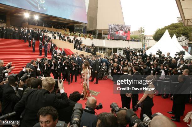 Actresses Laetitia Casta and Aishwarya Rai are surrounded by the media during red carpet arrivals for the 57th Cannes Film Festival Opening Ceremony...