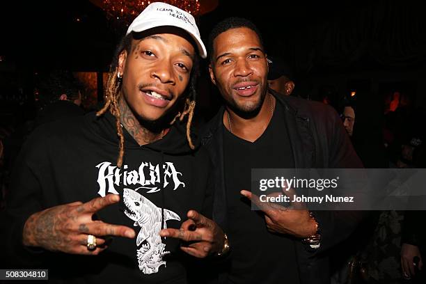 Wiz Khalifa and Michael Strahan attend the Wiz Khalifa album listening event on February 3, 2016 in New York City.