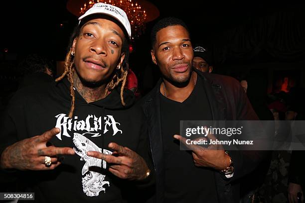 Wiz Khalifa and Michael Strahan attend the Wiz Khalifa album listening event on February 3, 2016 in New York City.