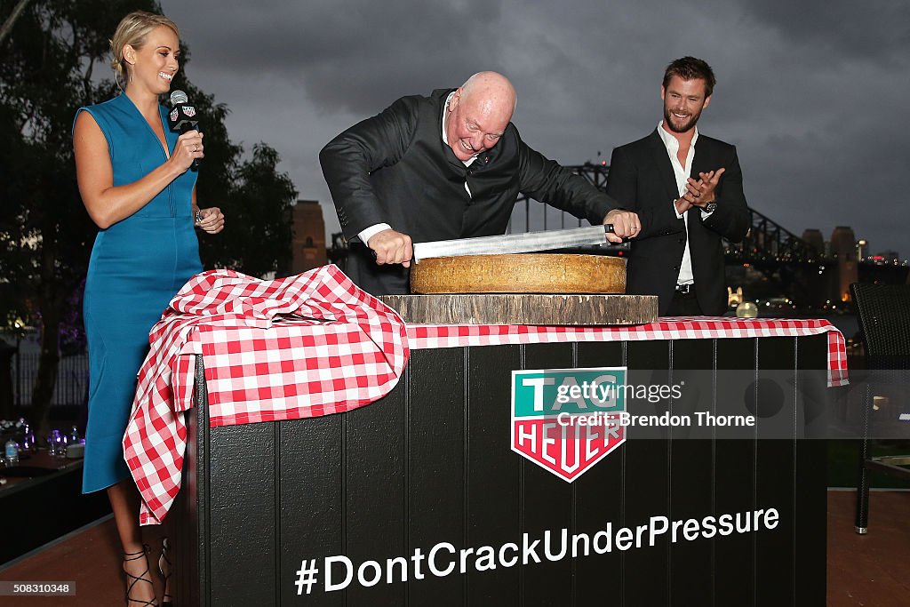 CEO of Tag Heuer, Jean-Claude Biver cuts a wheel of cheese while News  Photo - Getty Images