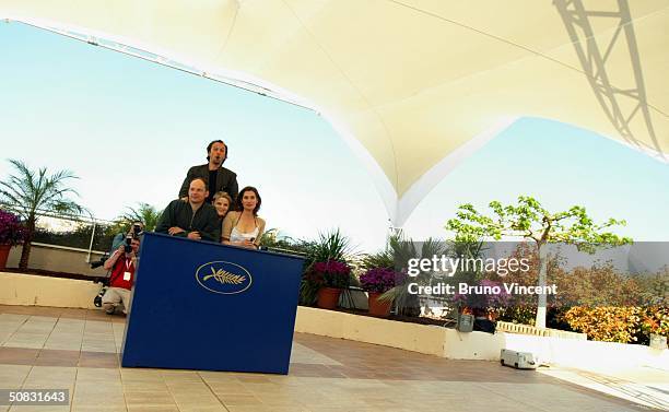 Actors Denis Podalydes and Vincent Perez with Director Lea Fazer and actress Emmanuelle Devos attend the "Bienvenue En Suisse" Photocall during the...