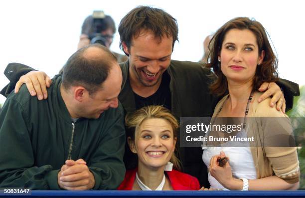 Actors Denis Podalydes and Vincent Perez with Director Lea Fazer and actress Emmanuelle Devos attend the "Bienvenue En Suisse" Photocall during the...