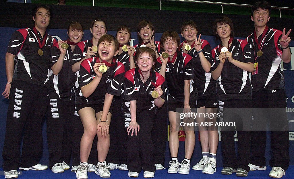 Japan Uber team show their bronze medals