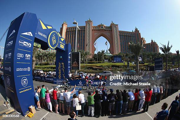 Elia Viviani of Italy and Team Sky crosses the finishing line to claim victory from Sacha Modolo of Italy and Lampre Merida in front of the Palm...