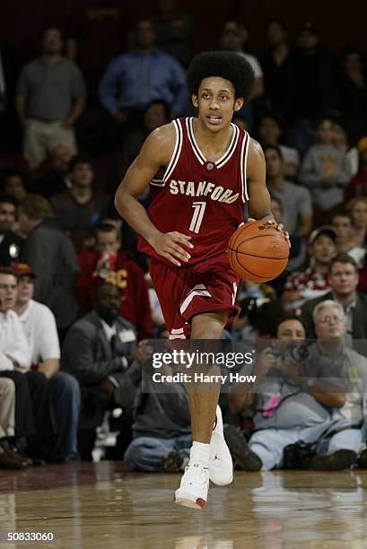 Josh Childress of the Stanford University Cardinal drive against the University of Southern California Trojans during the game at the Sports Arena on...