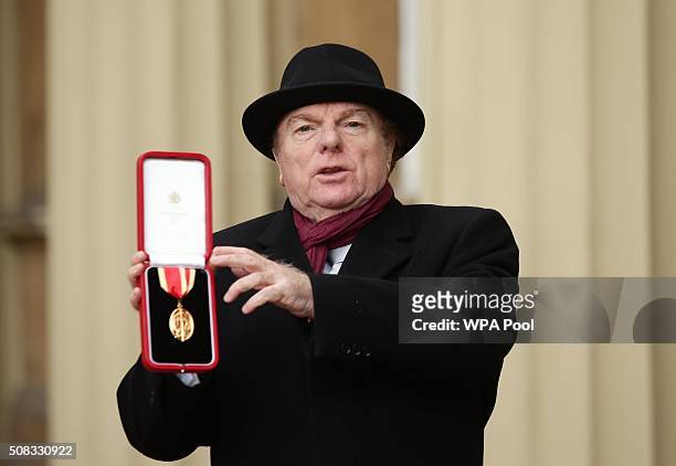 Singer, songwriter and musician Sir Van Morrison at Buckingham Palace, London, after being knighted by the Prince of Wales on February 4, 2016 in...