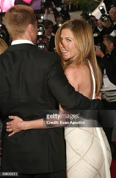 Actor Brad Pitt and wife actress Jennifer Aniston attend the World Premiere of the epic movie "Troy" at Le Palais de Festival on May 13, 2004 in...