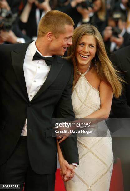 Actors Brad Pitt and Jennifer Aniston attend the World Premiere of epic movie "Troy" at Le Palais de Festival on May 13, 2004 in Cannes, France....