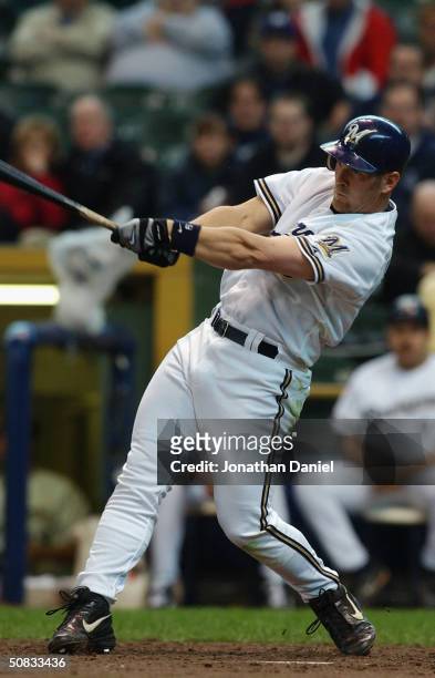 Left fielder Geoff Jenkins of the Milwaukee Brewers swings the bat during the game against the Arizona Diamondbacks at Miller Park on April 22, 2004...