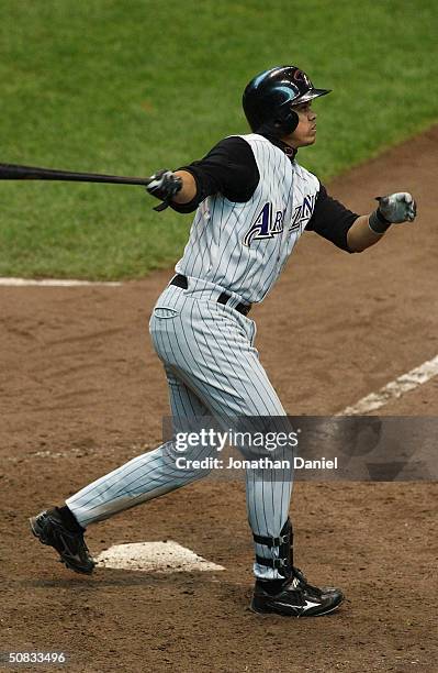 Shortstop Alex Cintron of the Arizona Diamondbacks takes a swing during the game against the Milwaukee Brewers at Miller Park on April 22, 2004 in...