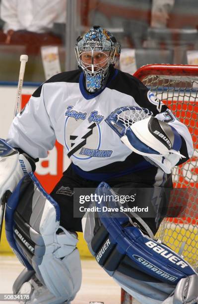 Goaltender Nikolai Khabibulin of the Tampa Bay Lightning warms up prior to the game against the Toronto Maple Leafs at Air Canada Centre on March 23,...