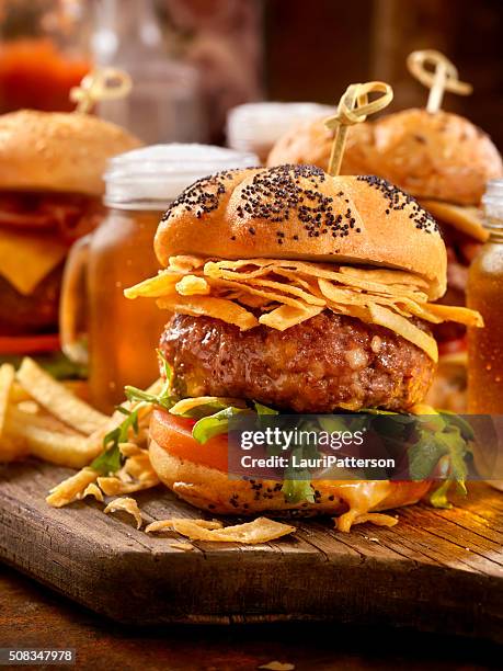 gourmet mini burgers with beer samplers - slider burger stock pictures, royalty-free photos & images