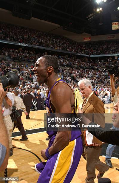 Kobe Bryant of the Los Angeles Lakers celebrates after they beat the San Antonio Spurs 74-73 on Derek Fisher's game-winning buzzer beater in Game...
