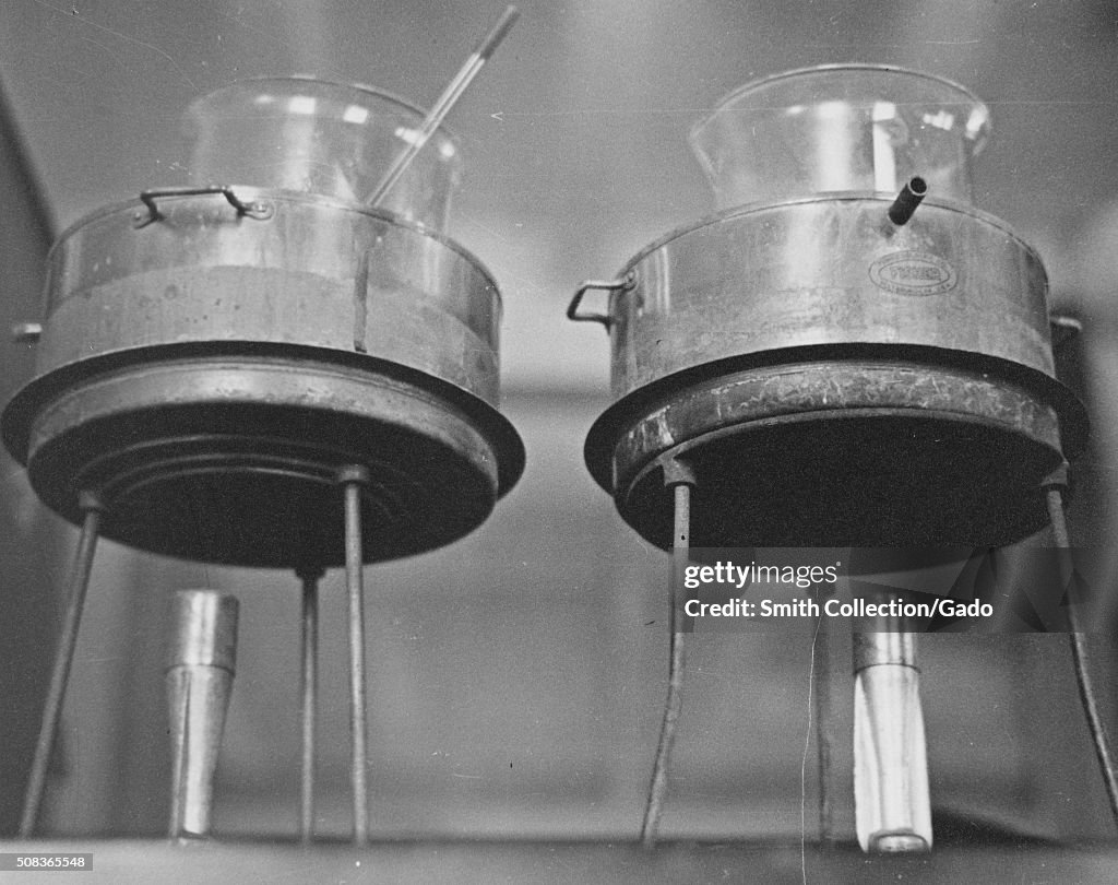 Close-up of a fermentation laboratory set up consisting of two Bunsen ...