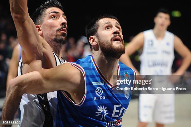 Andrea Zerini of Enel competes with Valerio Mazzola of Obiettivo Lavoro during the LegaBasket match between Virtus Obiettivo Lavoro and Enel Brindisi...