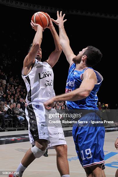 Valerio Mazzola of Obiettivo Lavoro competes with Andrea Zerini of Enel during the LegaBasket match between Virtus Obiettivo Lavoro and Enel Brindisi...