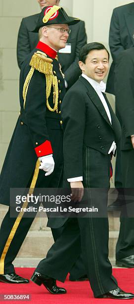 Japanese Crown Prince Naruhito arrives to attend the wedding between Danish Crown Prince Frederik and Mary Donaldson in Copenhagen Cathedral May 14,...