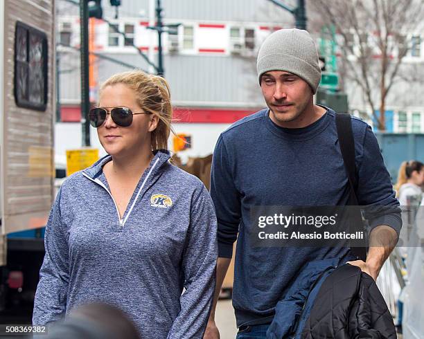 Amy Schumer and Ben Hanisch are seen heading to set of 'Inside Amy Schumer' early in the morning on February 4, 2016 in New York City.