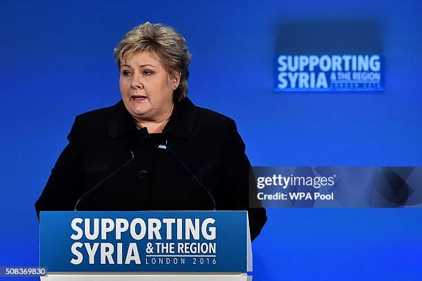 Norwegian Prime Minister Erna Solberg addresses delegates during the fourth 'Thematic Pledging Session' during the 'Supporting Syria Conference' at...