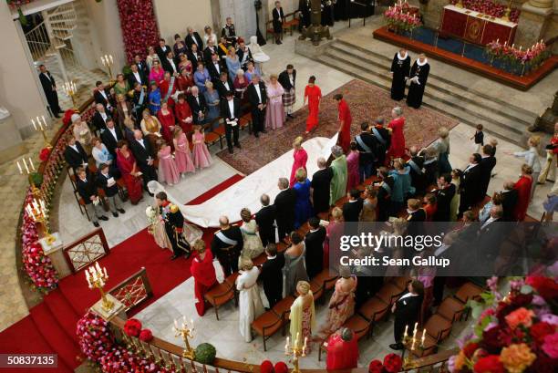 Danish Crown Prince Frederik walks down the isle with his new bride Princess Mary after marrying at the Copenhagen Cathedral May 14, 2004 in...