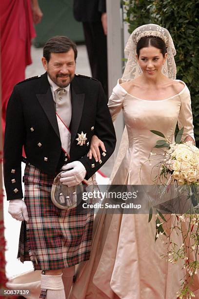 Miss Mary Elizabeth Donaldson walk down the isle with her father Dr. John Donaldson moments before marrying Crown Prince Frederik at the Copenhagen...