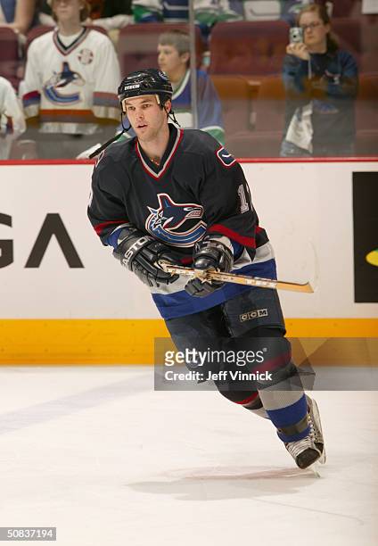 Jason King of the Vancouver Canucks warms up prior to the game against the Calgary Flames in the first round of the 2004 NHL Stanley Cup Playoffs at...