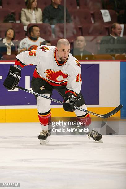 Chris Simon of the Calgary Flames skates during warm up prior to the game against the Vancouver Canucks in the first round of the 2004 NHL Stanley...