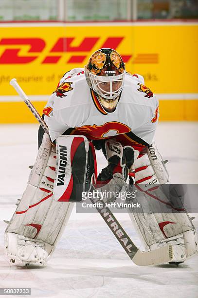 Miikka Kiprusoff of the Calgary Flames looks on during the game against the Vancouver Canucks in the first round of the 2004 NHL Stanley Cup Playoffs...