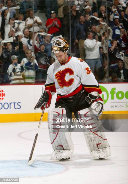 Miikka Kiprusoff of the Calgary Flames skates back to his crease during the game against the Vancouver Canucks in the first round of the 2004 NHL...