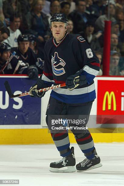 Sami Salo of the Vancouver Canucks defends the neutral zone during the game against the Calgary Flames in the first round of the 2004 NHL Stanley Cup...