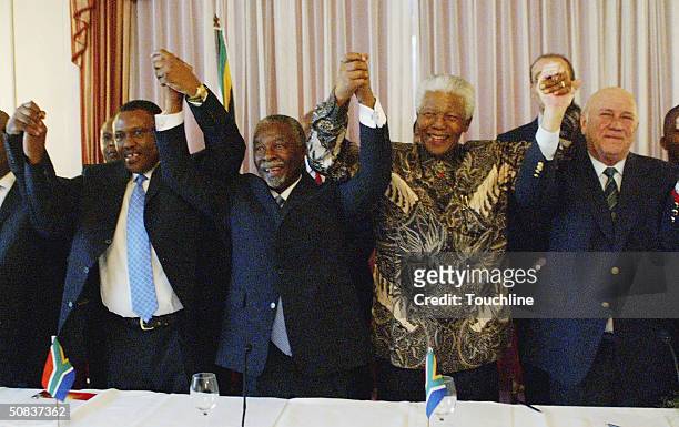 South Africa 2010 Bid Chairman Irvin Khoza, South African President Thabo Mbeki and former South African heads of state Nelson Mandela and F.W. De...