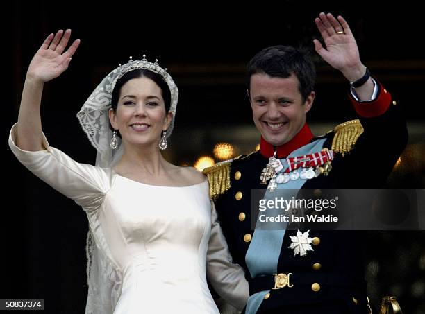 Danish Crown Prince Frederik and his bride Princess Mary wave as the Royal couple appear on the balcony of Christian VII's Palace after their wedding...