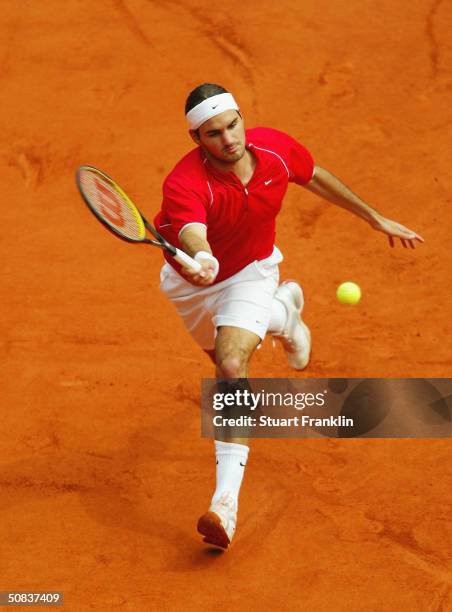 Roger Federer of Switzerland in action during his match against Carlos Moya of Spain at The ATP Tennis Masters Series Hamburg at the Rothebaum Tennis...