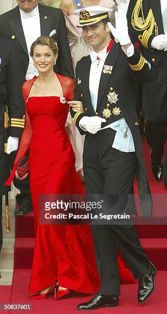 Crown Prince Felipe of Spain and fiancee Letizia Ortiz Rocasolano leave Copenhagen Cathedral after the wedding ceremony between Danish Crown Prince...