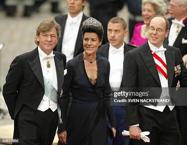 Prince Albert and Princess Caroline of Monaco together with Caroline's husband Prince Ernst August Hannover of Germany arrive at the Cathedral in...