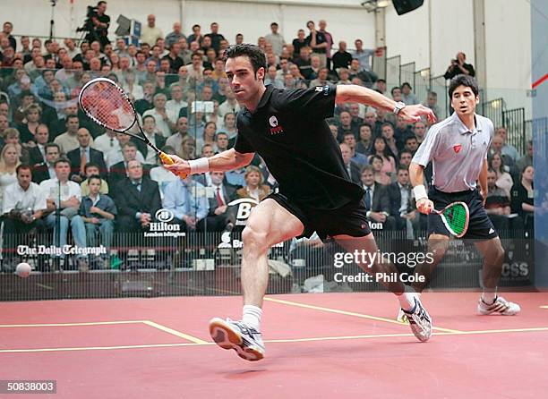 Joe Kneipp of Australia playing against Thierry Lincou of France in the Finals on day 5 of the Brit Insurance Super Series Finals on May 14, 2004 in...