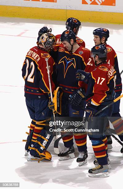 Goalie Kari Lehtonen of the Atlanta Thrashers celebrates with his teammates during the game against the Washington Capitals at the Philips Arena on...