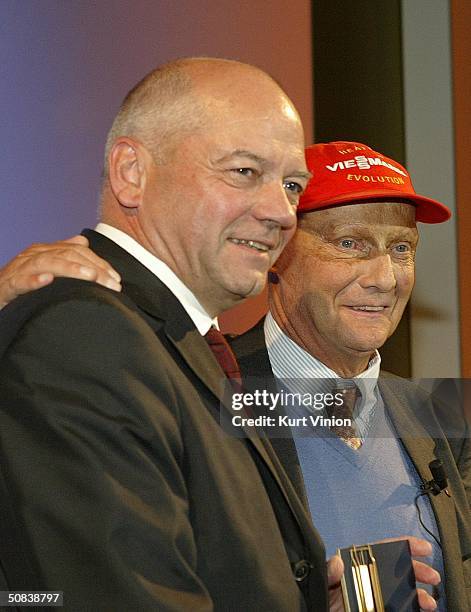 Former Formula 1 driver and entrepreneur Niki Lauda presents the ?Golden Feather? for Company Communications to Joachim Hunold, CEO of Air Berlin in...