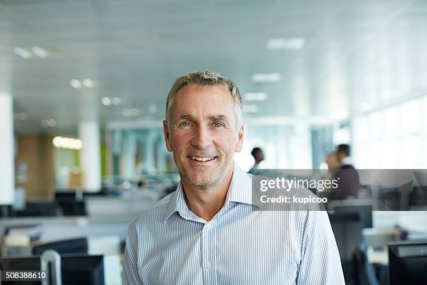 i've achieved a lot in my team - mature businessman stock pictures, royalty-free photos & images