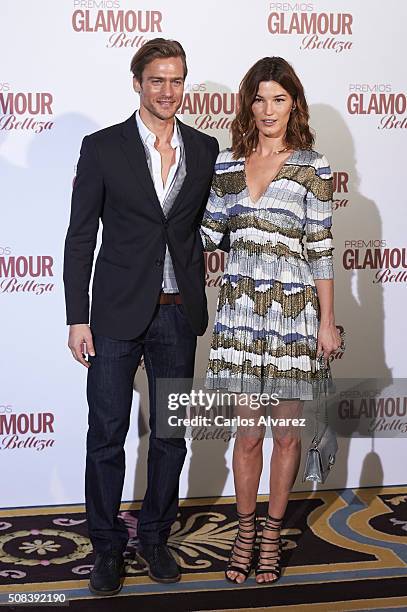 Models Jason Morgan and Hanneli Mustaparta attend the "Glamour Beauty" awards at the Ritz Hotel on February 4, 2016 in Madrid, Spain.