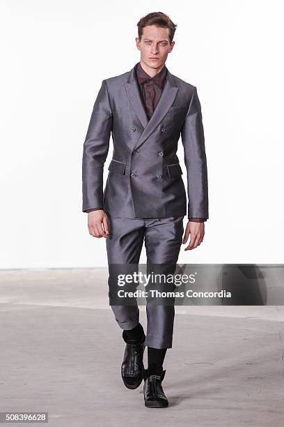 Model walks the runway wearing Cadet during New York Fashion Week Men's Fall/Winter 2016 at Skylight at Clarkson Sq on February 3, 2016 in New York...