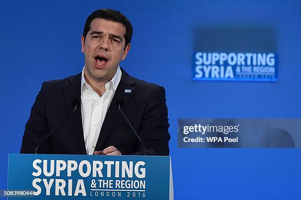 Greek Prime Minister Alexis Tsipras addresses delegates during the fourth 'Thematic Pledging Session' during the 'Supporting Syria Conference' at The...