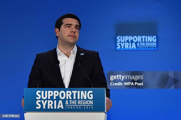 Greek Prime Minister Alexis Tsipras addresses delegates during the fourth 'Thematic Pledging Session' during the 'Supporting Syria Conference' at The...