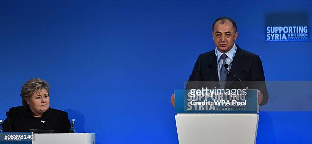 Norwegian Prime Minister Erna Solberg listens as Lebanese Education Minister Elias Bou Saab addresses delegates during the fourth 'Thematic Pledging...