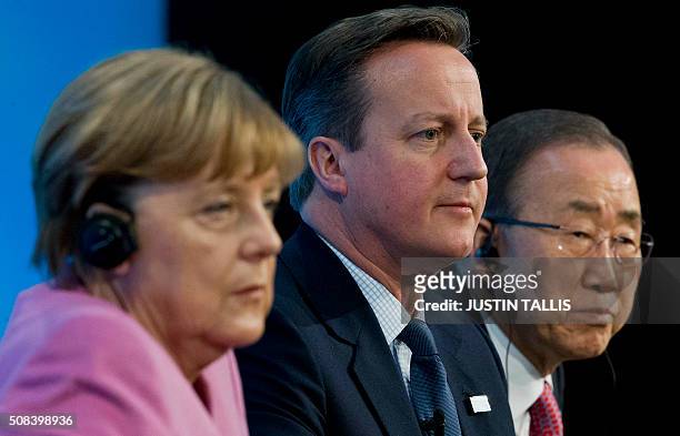 German Chancellor Angela Merkel British Prime Minister David Cameron and UN Secretary-General Ban Ki-moon sit on stage during a press conference at...